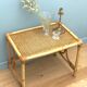Table basse en rotin et plateau cannage