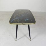 Vintage coffee table with glass top and angled legs, 1950s