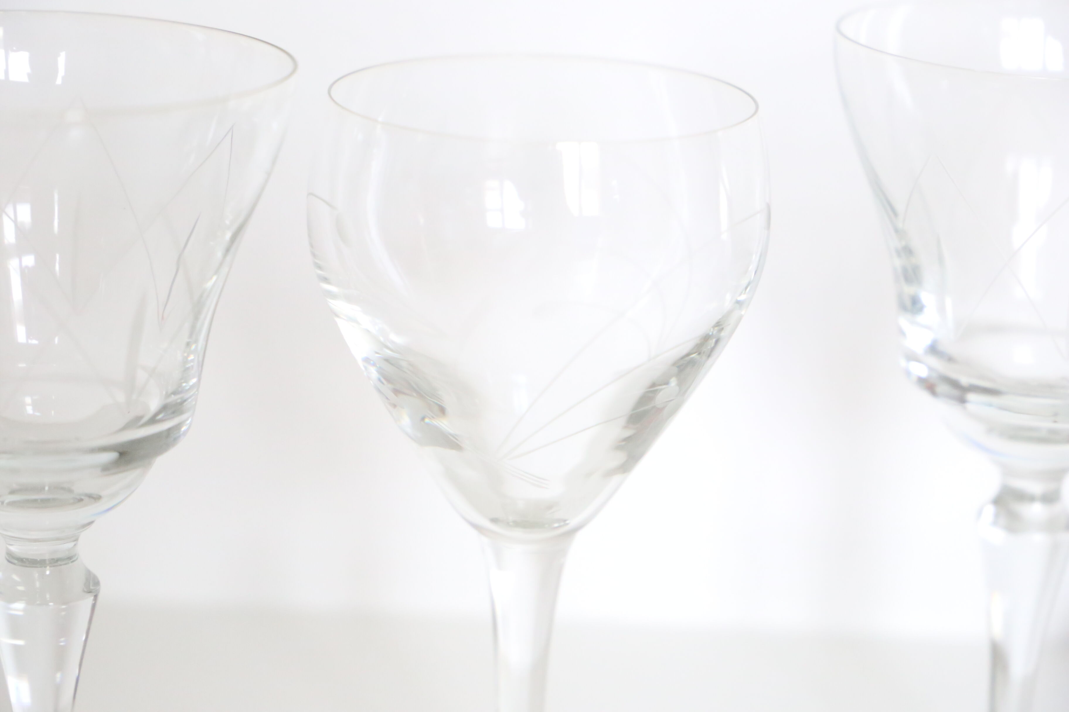 Set of 4 mismatched, crystal wine glasses