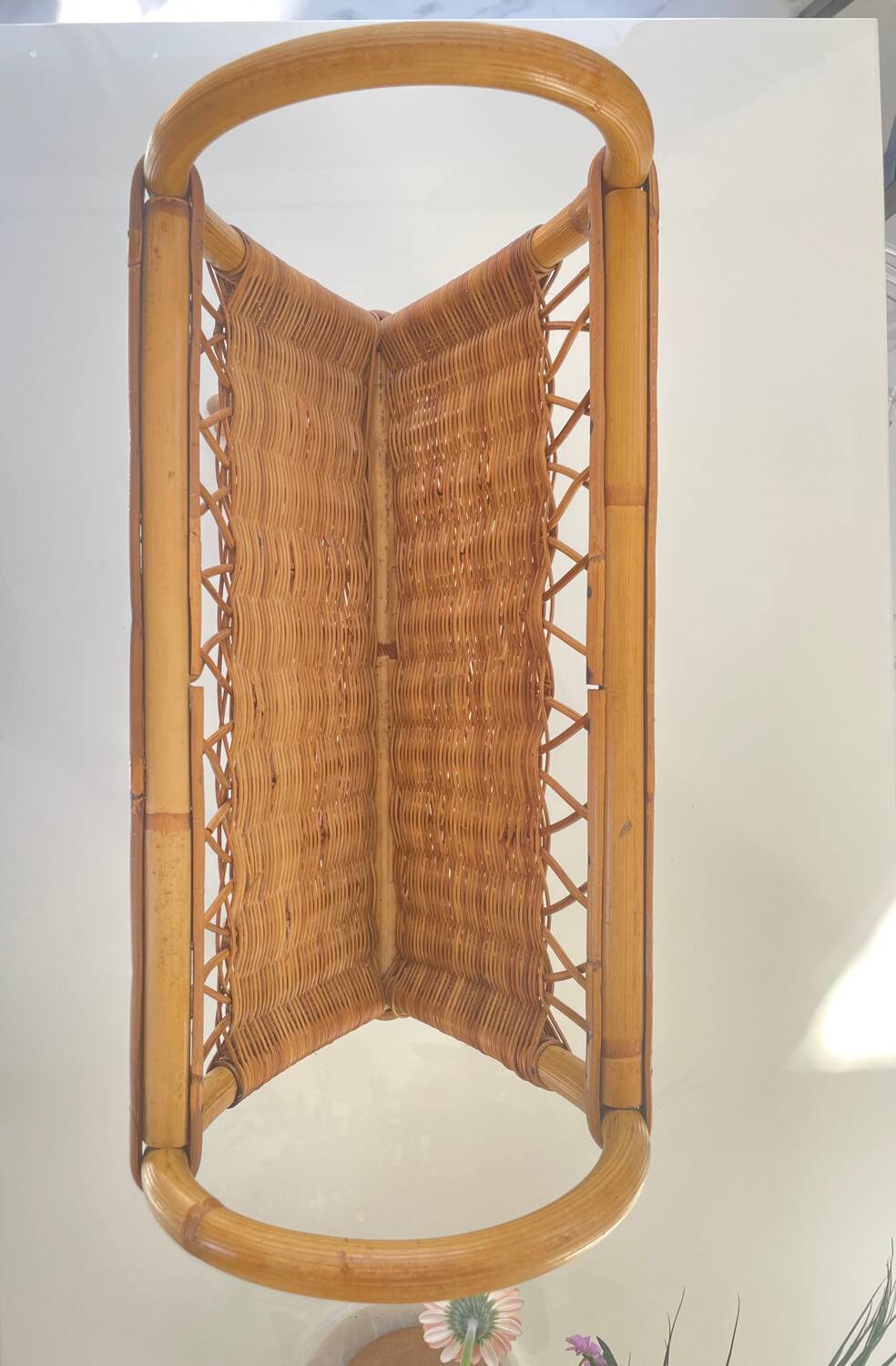 Old rattan magazine rack from the 70s