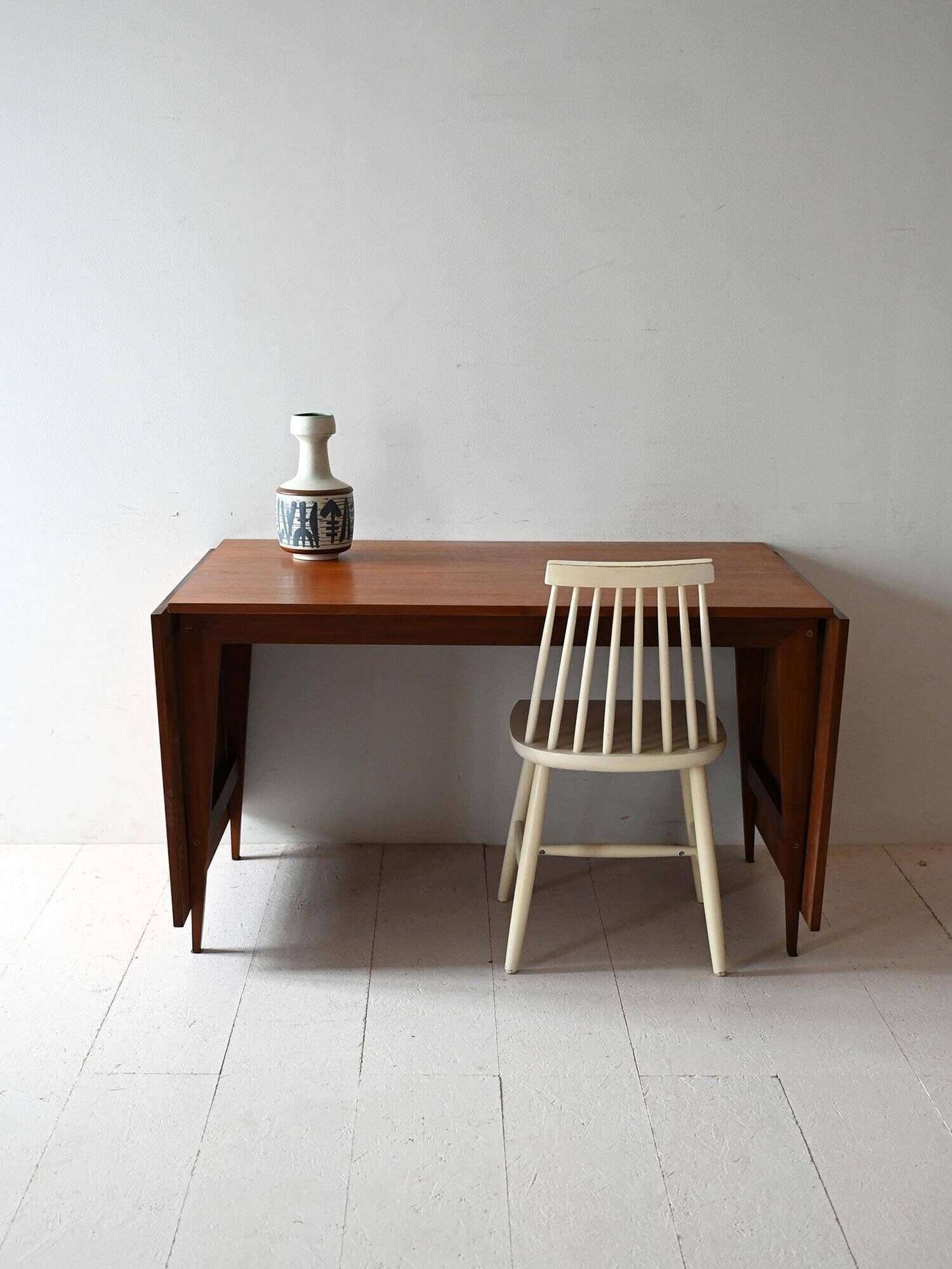 Vintage teak table by ISA Bergamo with drop-leaf extensions