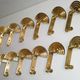 1 out of 12 pcs. Postmodern italian designer sottsass brass wall coat hooks