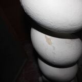 White plaster column, twisted.