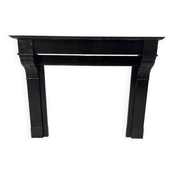 Napoleon III period fireplace with a black marble corbel. 19th century.