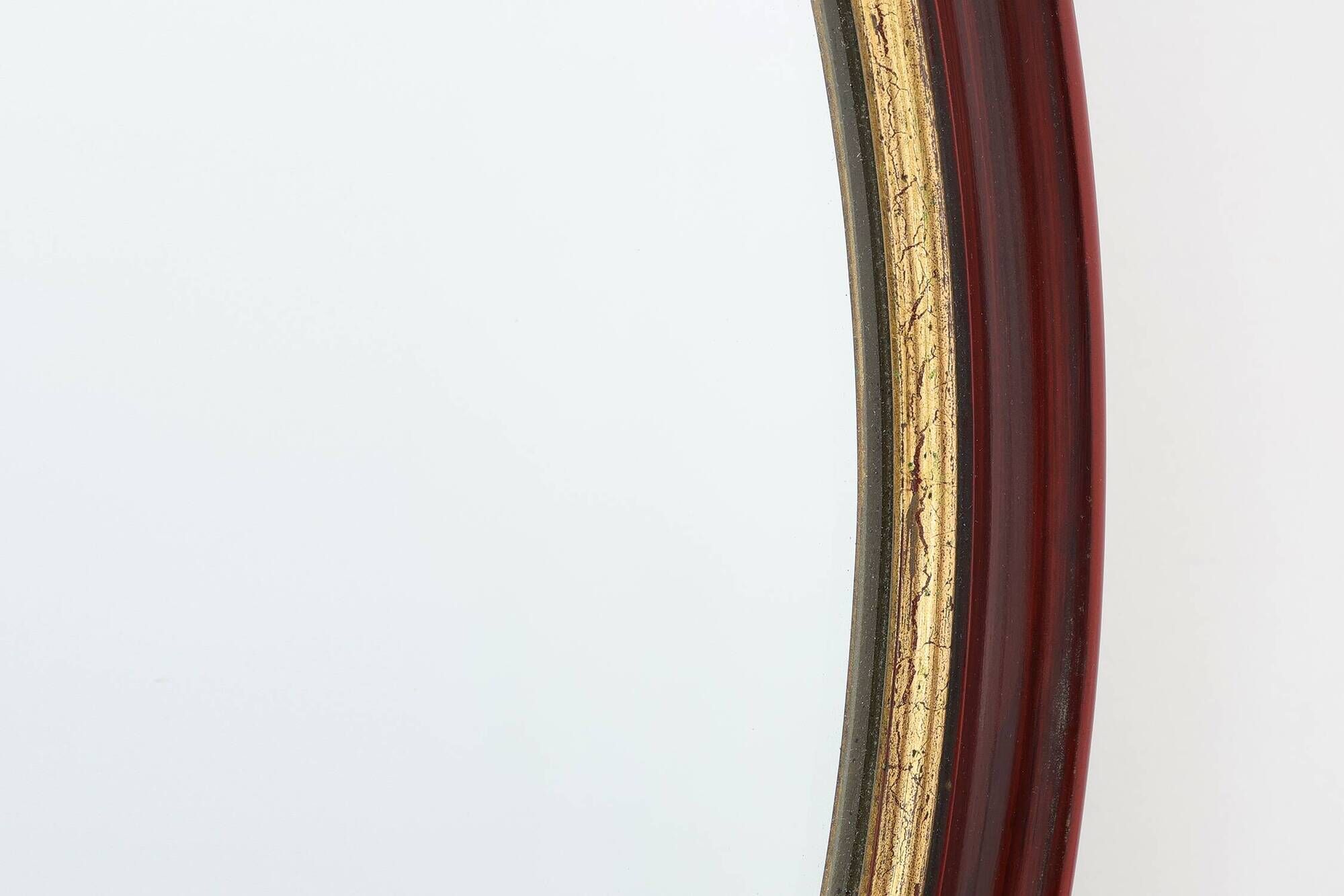French Burgundy Lacquered Oval Mirror with Gilt Inner Edge, circa 1920