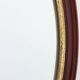 French Burgundy Lacquered Oval Mirror with Gilt Inner Edge, circa 1920