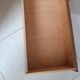 Rattan and wood splayed-leg chest of drawers