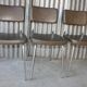 3 bronze-green faux leather chairs with chrome frames