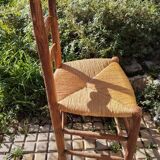 Old farm chair in wood and straw, Normandy