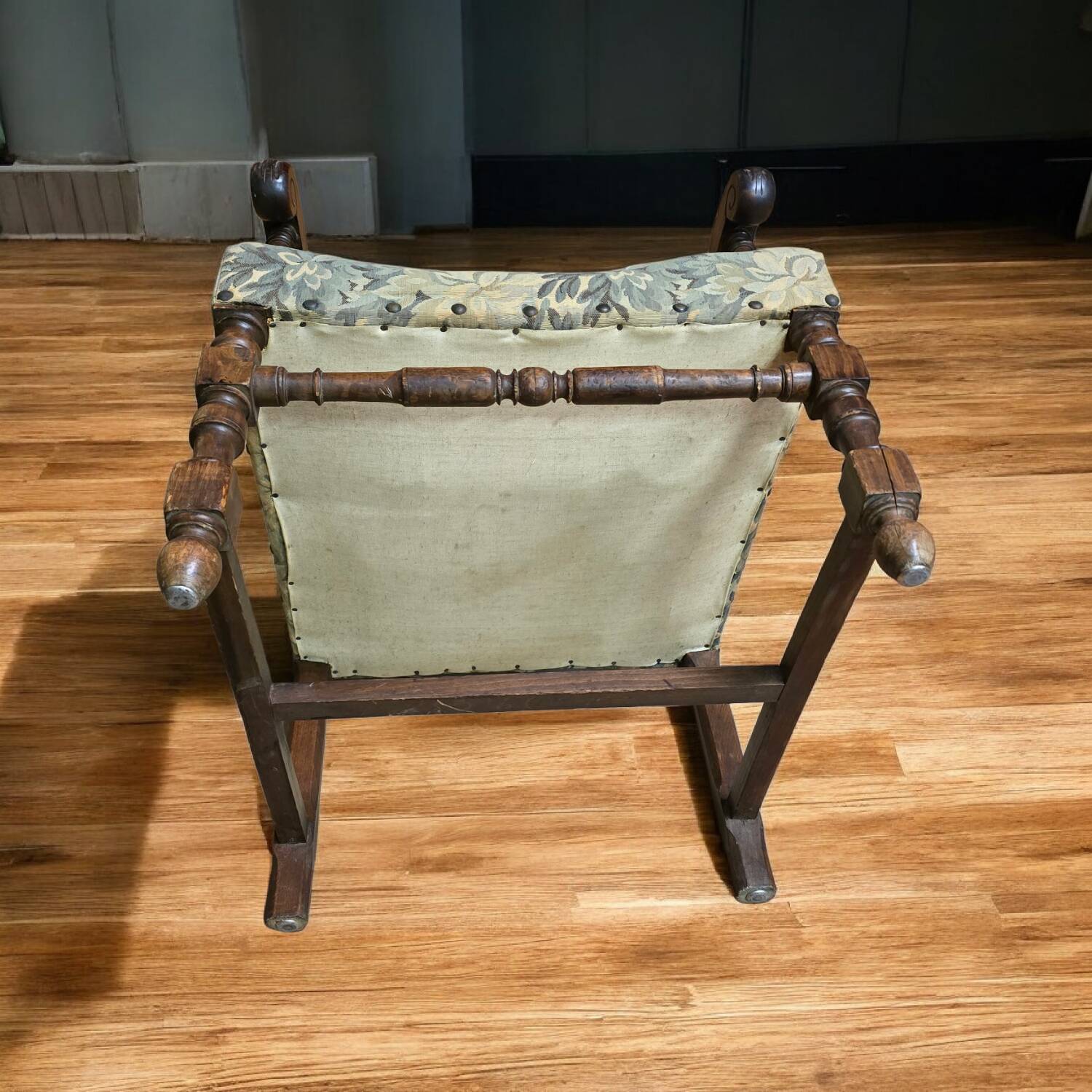 Empire armchair in carved wood and floral fabric