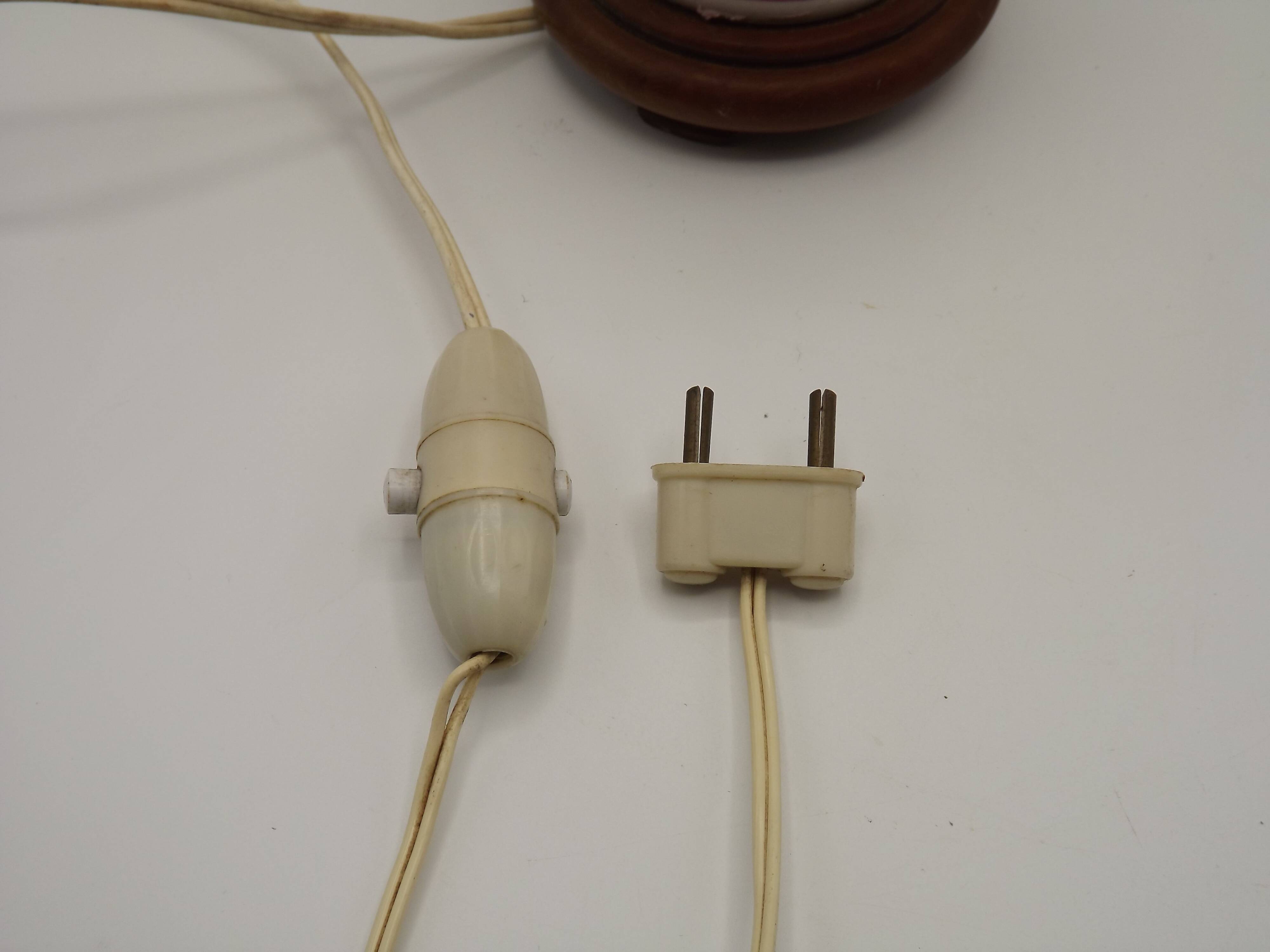 Pretty French vintage hand-painted ceramic floral lamp base on wooden plinth.