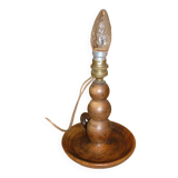 Turned wooden lamp base.