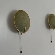 Pair of green plexiglass and gold metal wall lights by Erco, 1950s, Germany.