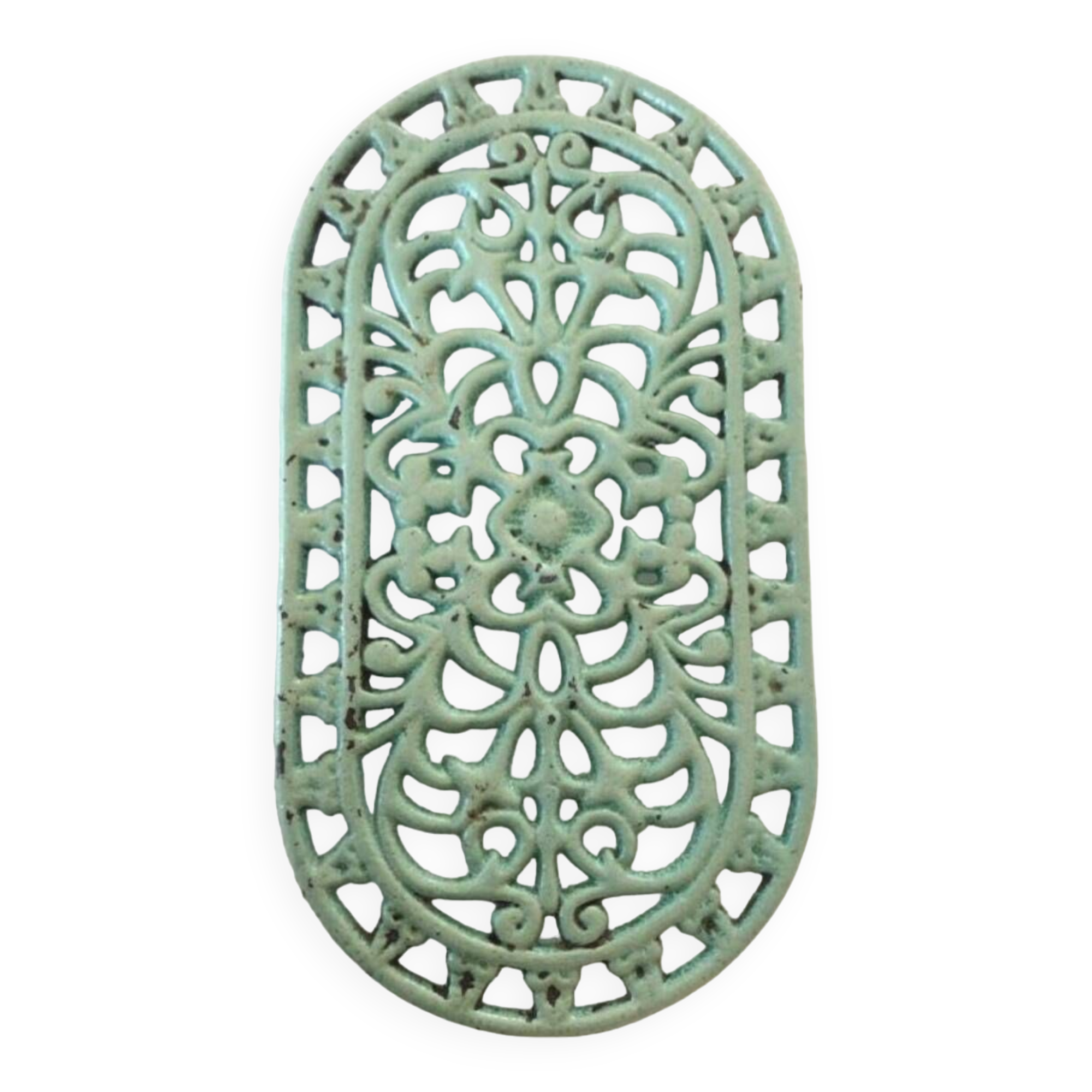 Old oval trivet in green enameled cast iron