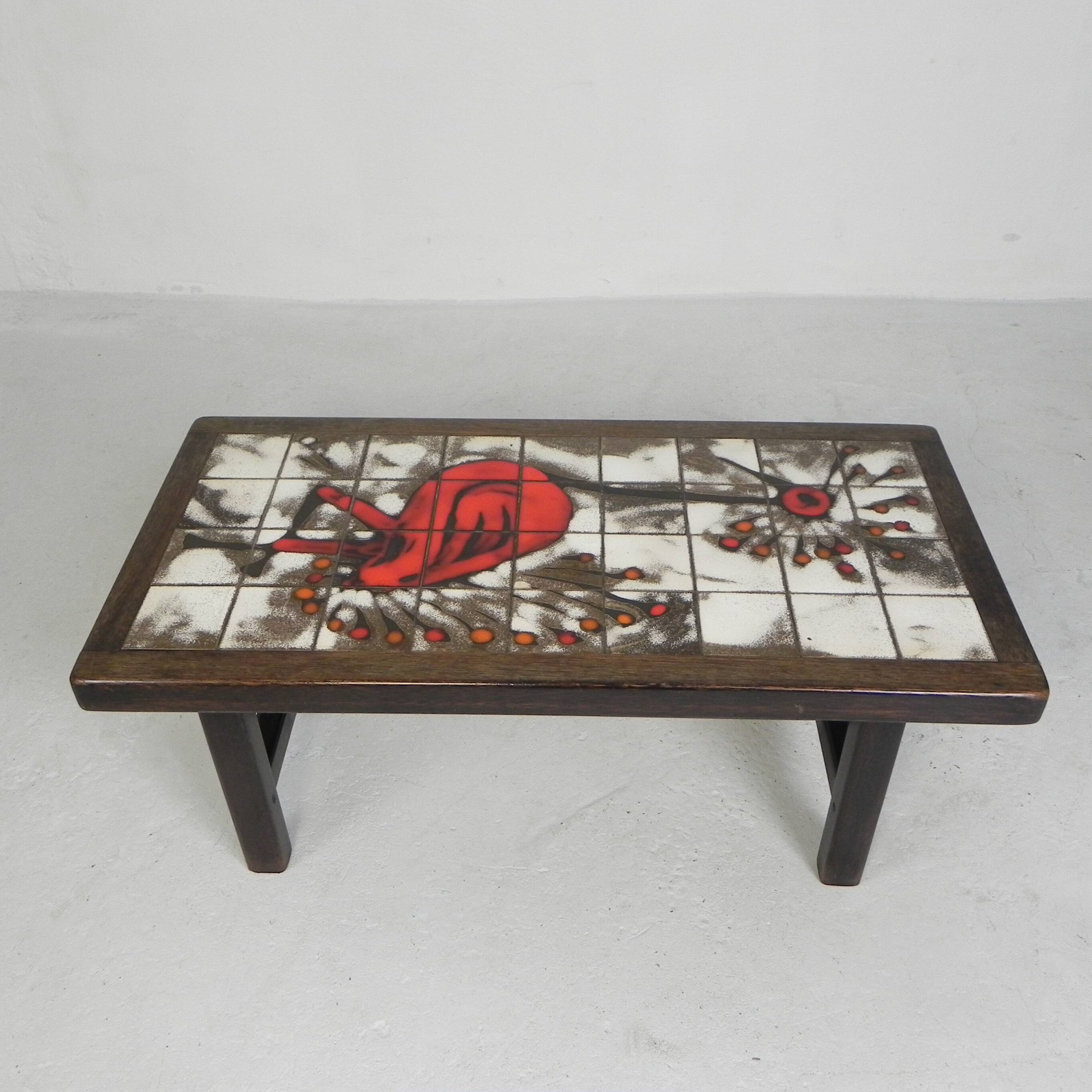 Square tile table from Vallauris, signed Dan with an image of a fantastic bird, 1960s.