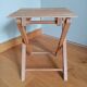 Tabouret pliant porte-plante en bois