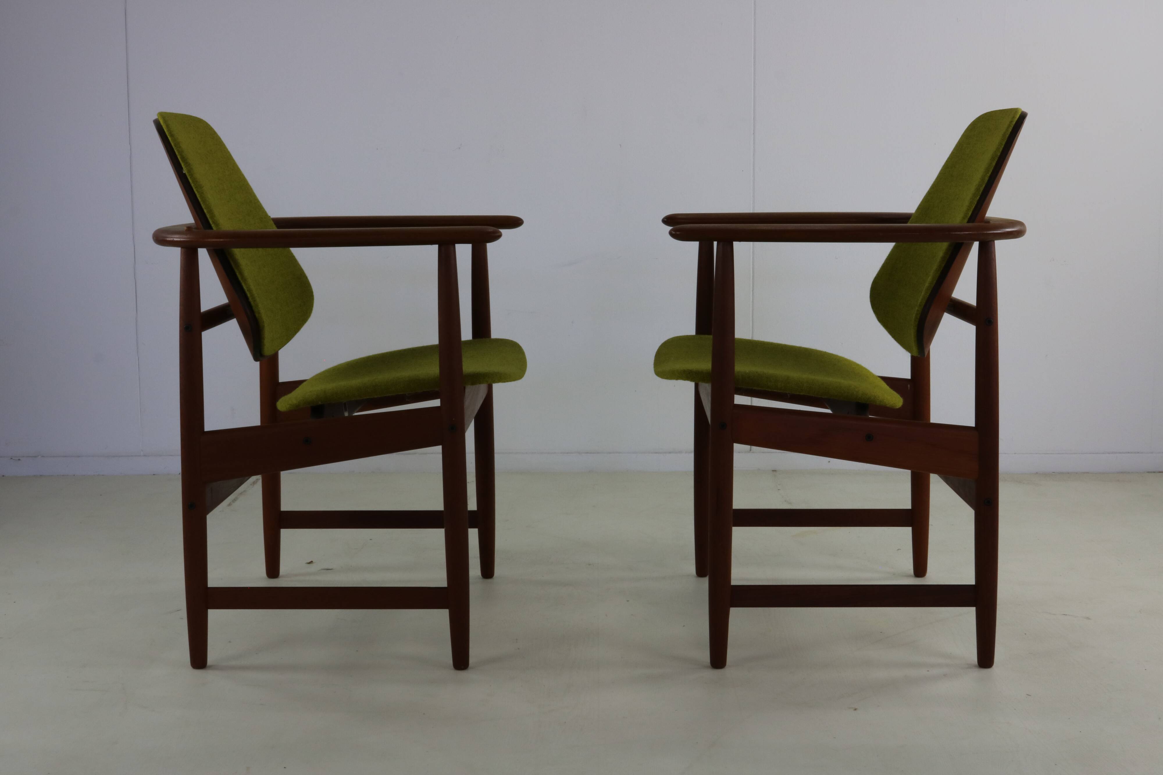 Two Danish design lounge arm chairs by Arne Hovmand Olsen