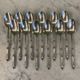 12 small silver-plated metal spoons, Russian-style handles, SAM Lux