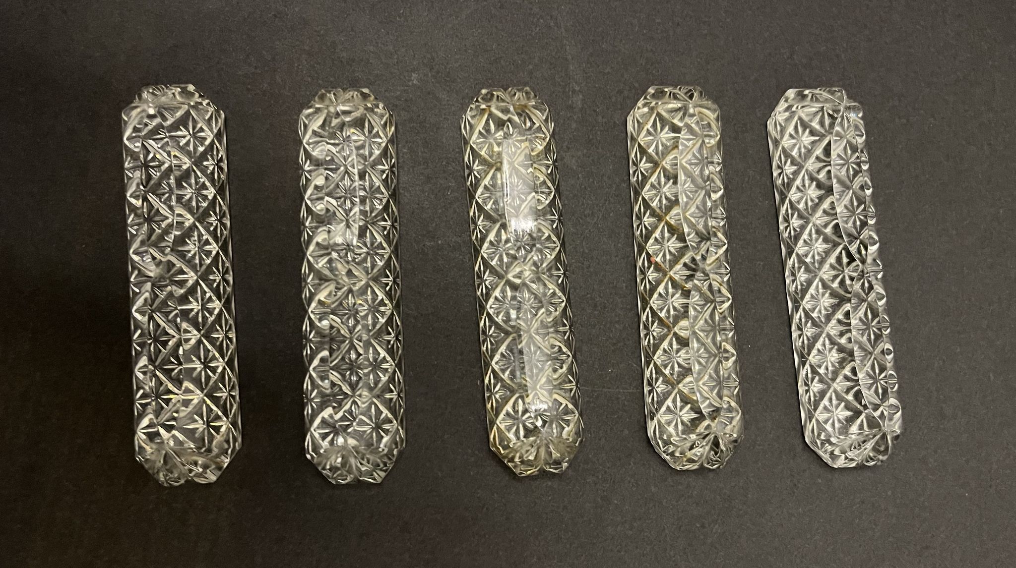 5 porte-couteaux en cristal taillé