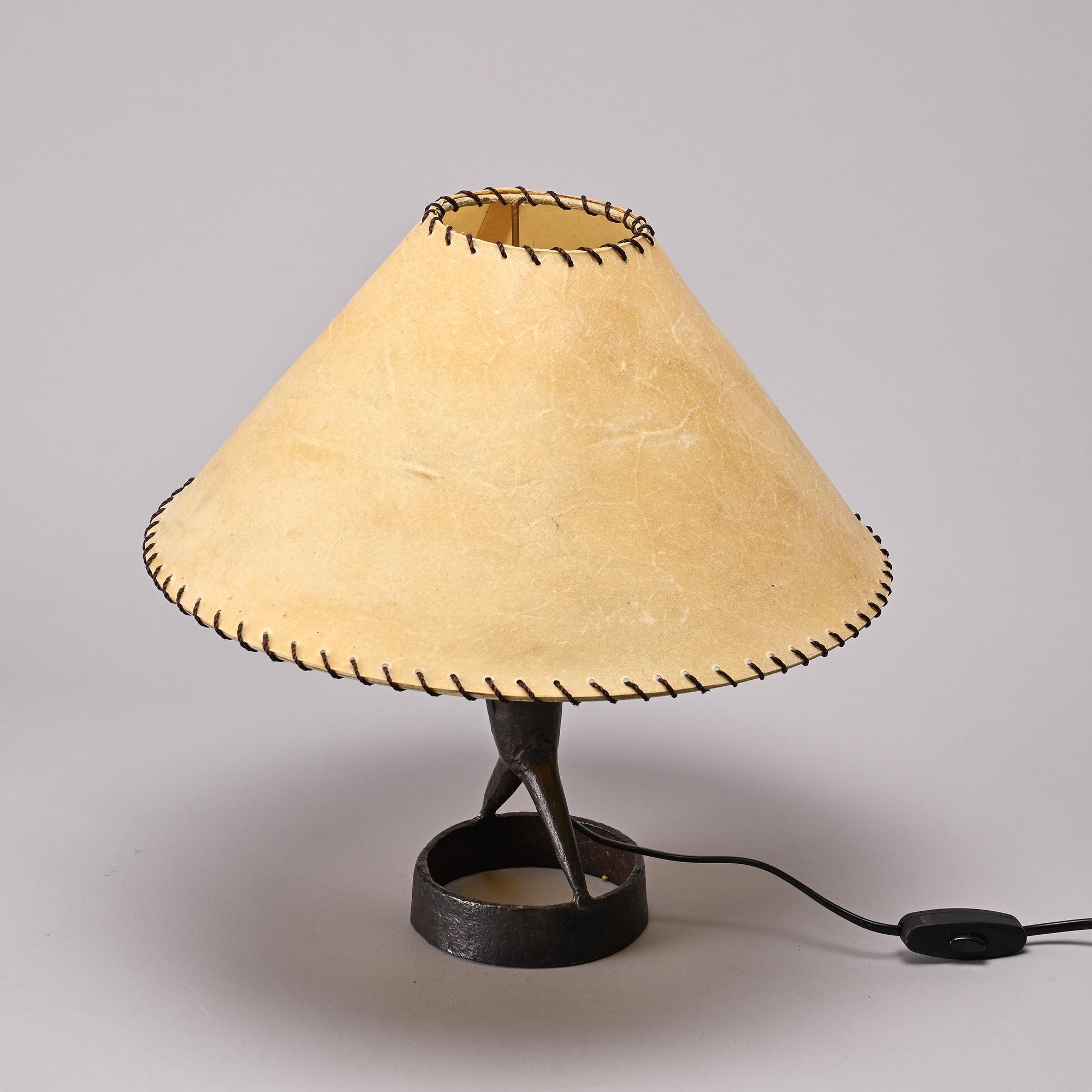 Table lamp in hammered iron by Léopold Gest, France, circa 1970.