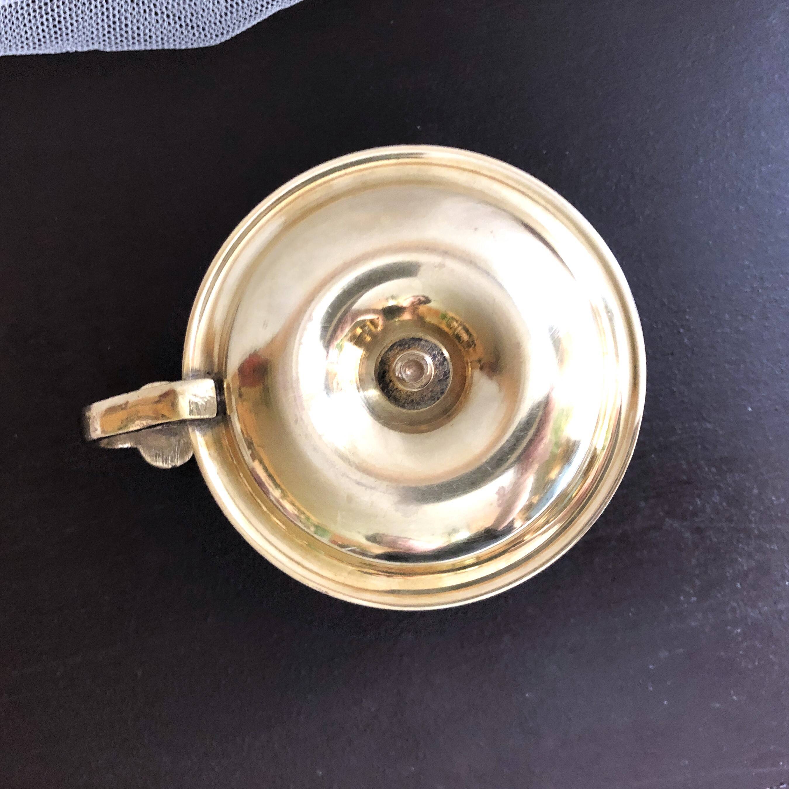 Hand candle holder called "Cave Rat" vintage golden brass