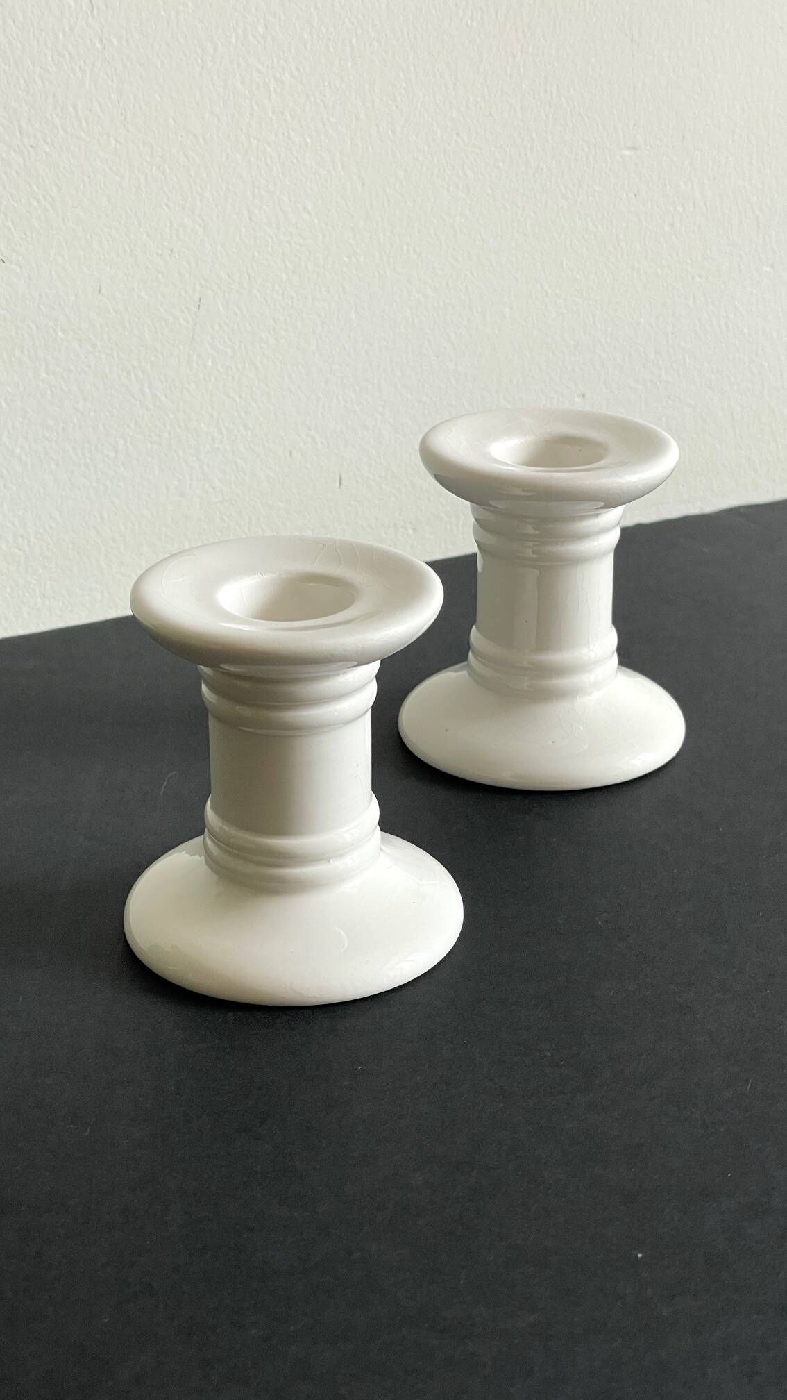 Pair of White Ceramic Candlesticks