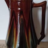 Antique enamelled pitcher