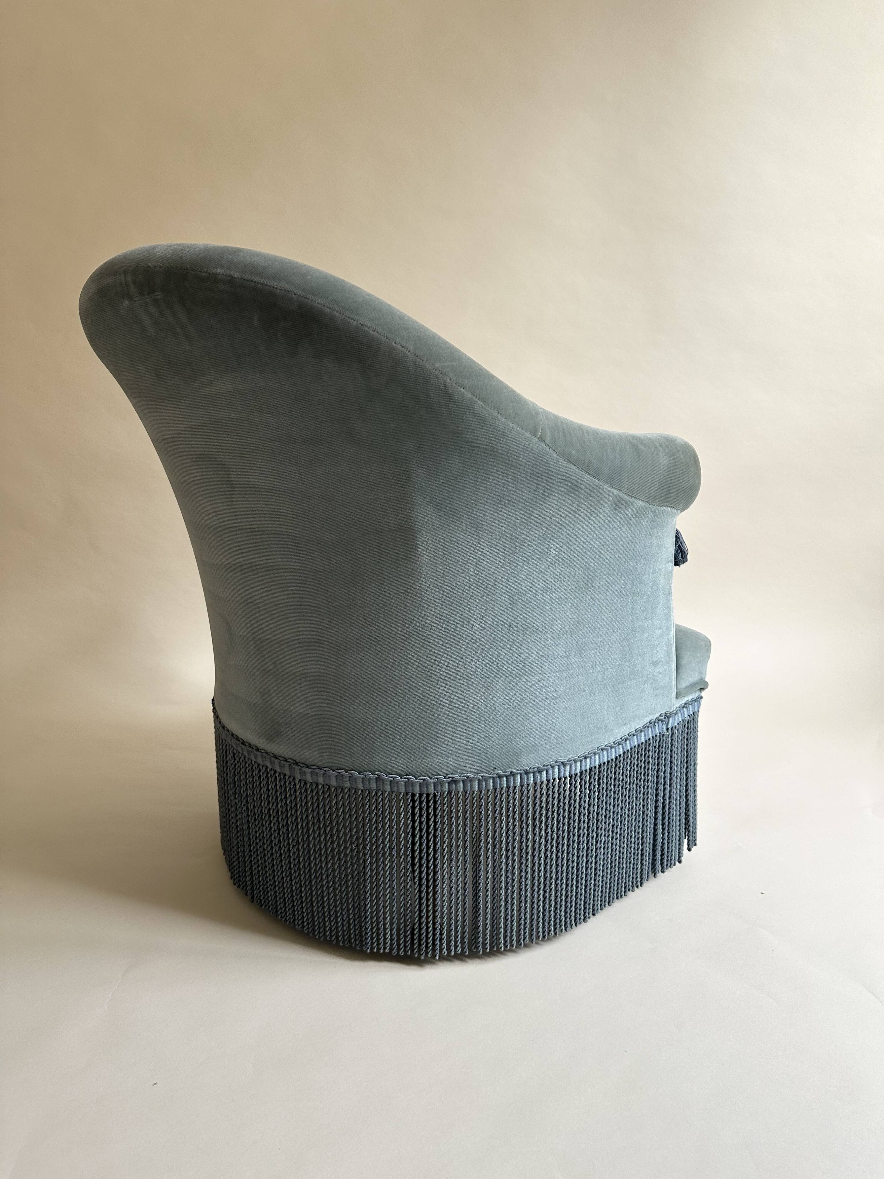 Blue velvet frog armchairs