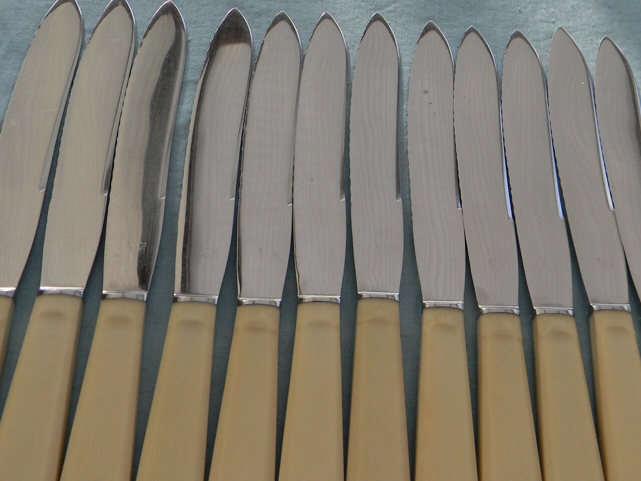 Set of 12 vintage stainless steel blade knives
