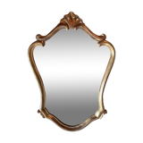 1950s rococo mirror in gilded stucco.