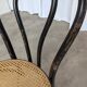 Chaise de salle à manger vintage style Thonet en bois noir et assise en cannage 1970