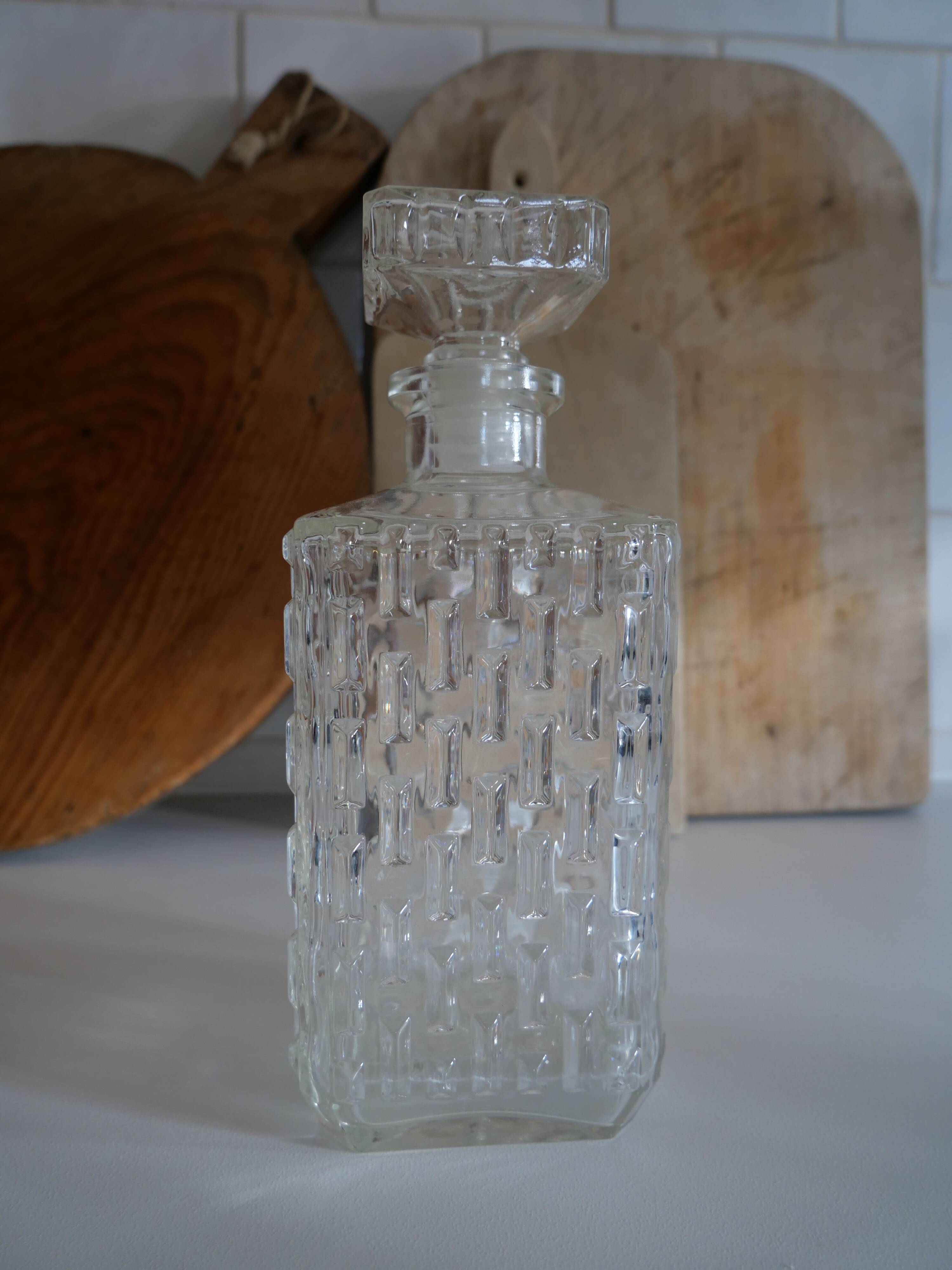 Vintage whisky decanter in chiseled glass