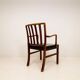 Mid-century armchair by Ole Wanscher for Fritz Hansen, stained beech and leather.