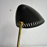 Charming brass and black metal table lamp