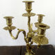 Pair of bronze candelabras and brass bobèches