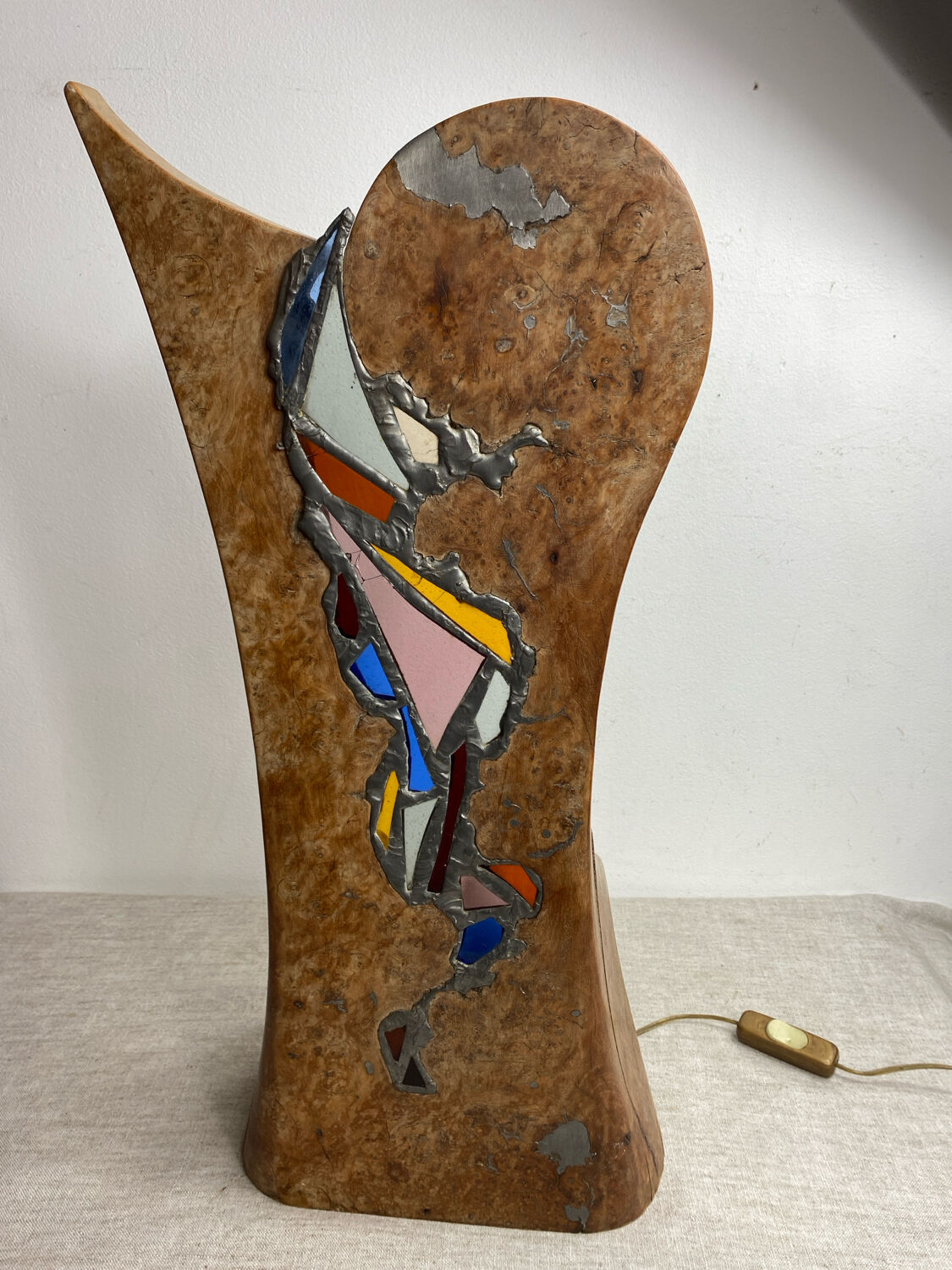 Carved wooden lamp and stained glass