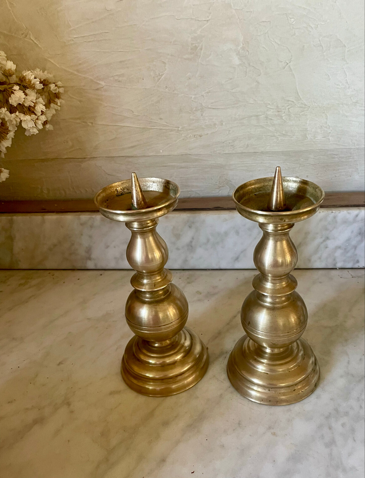 Pair of solid brass candlesticks from the 19th century.