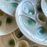 11 oyster plates 1960.