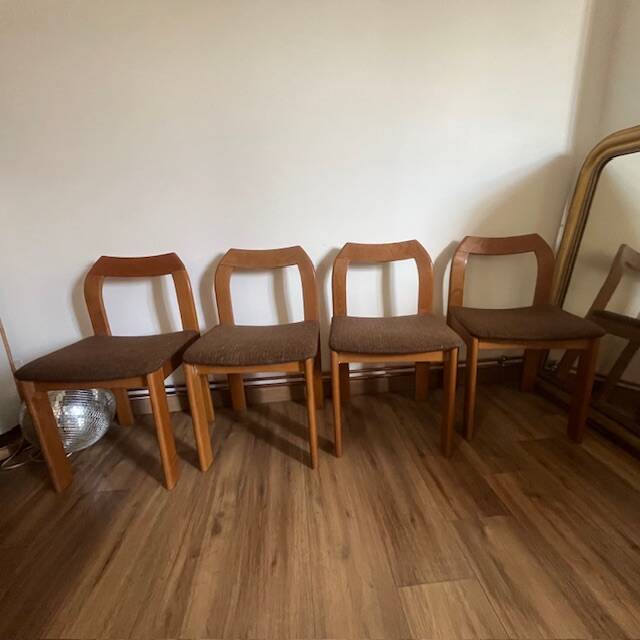 4 brown chairs