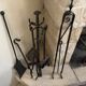 Complete fireplace tool set (10 pieces) in wrought iron