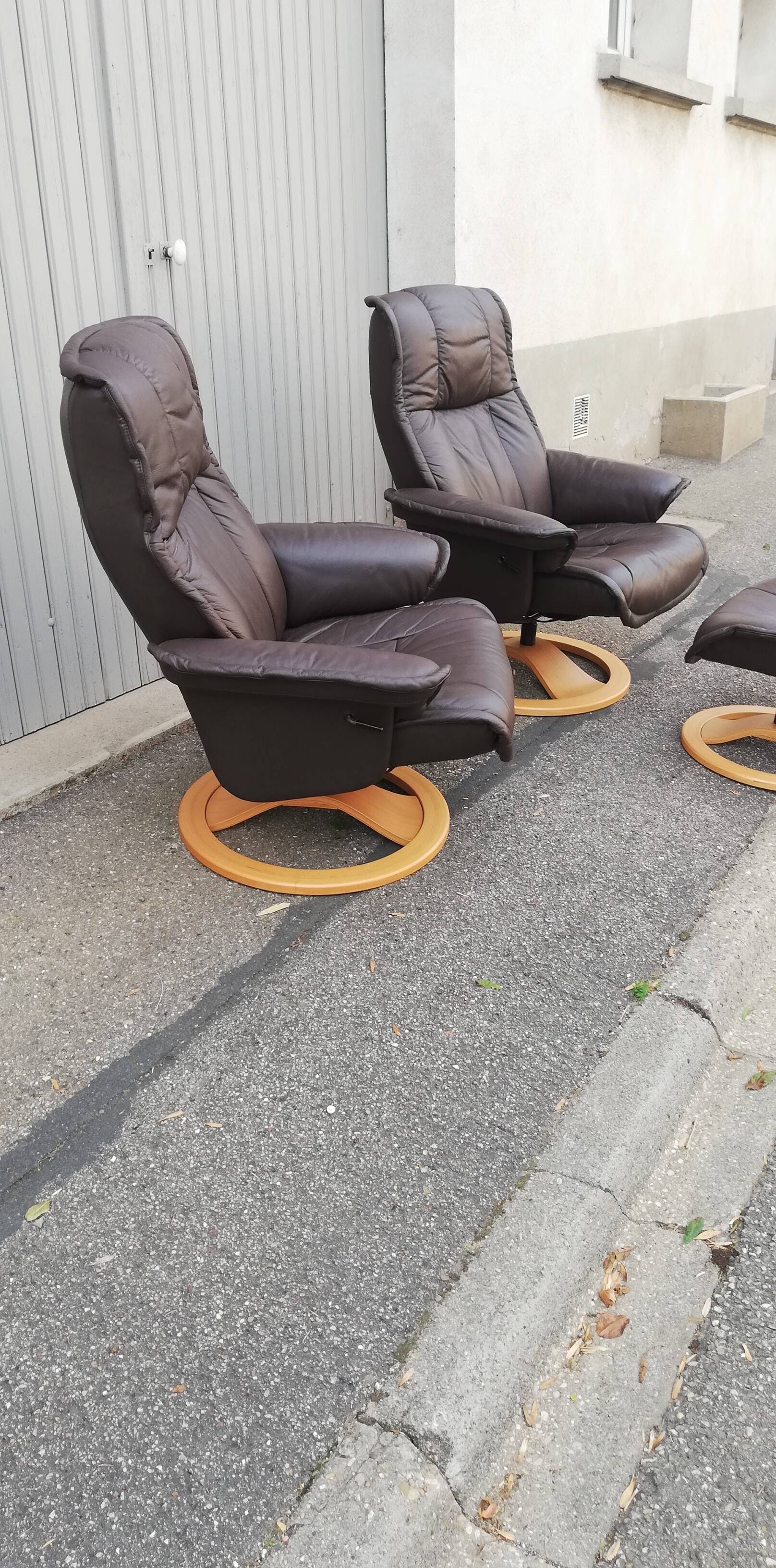 Pair of vintage armchairs with ottoman