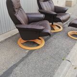 Pair of vintage armchairs with ottoman