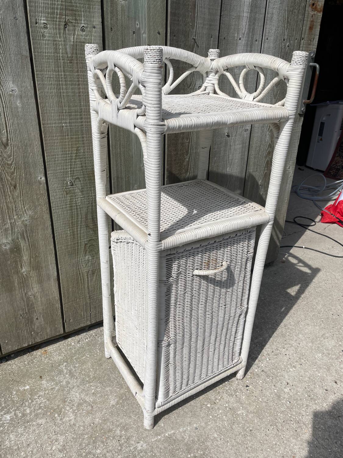 Small white wicker bathroom shelf
