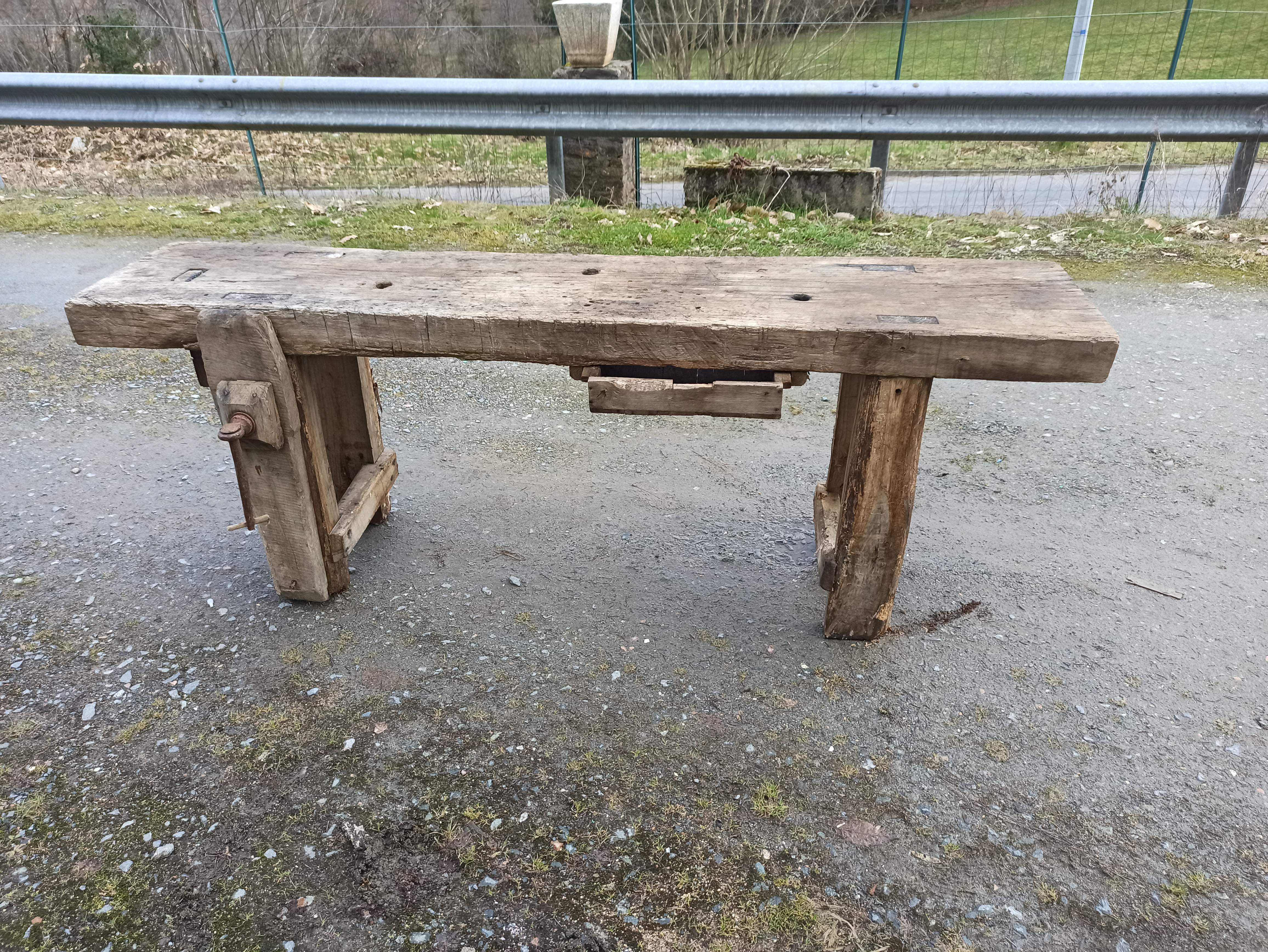 Old wooden workbench furniture by trade with vice