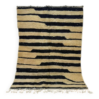 Handmade Moroccan rug in ecru with coloured patterns, 250cm x 150cm.