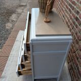 Marble-topped chest of drawers