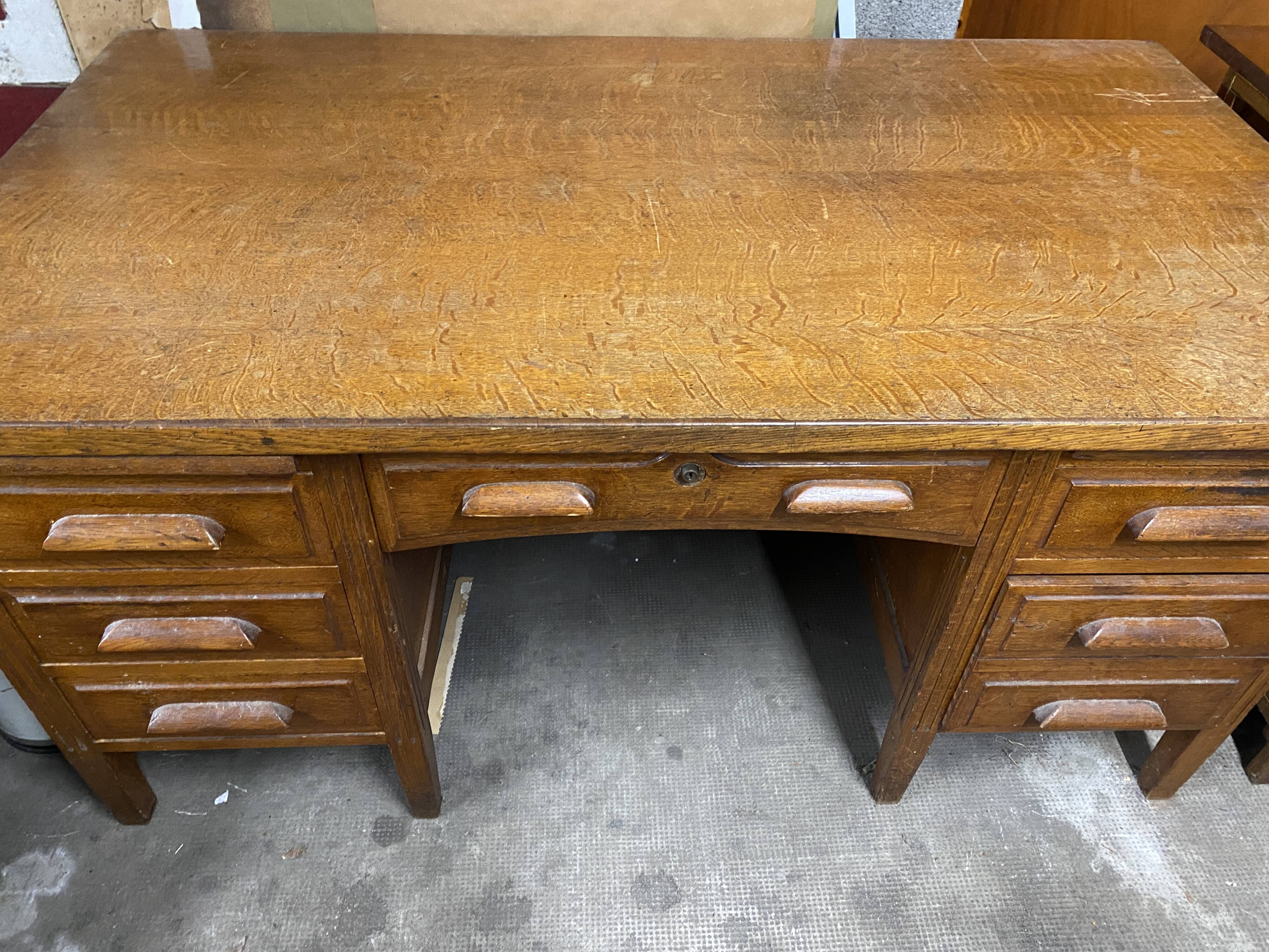 Teacher's desk from the 1950s on legs.