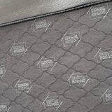 Vintage Roche Bobois sofa – Soleil Noir model – patinated black leather – 2-seater