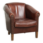 Sheepskin club armchair in English style with brown colour scheme