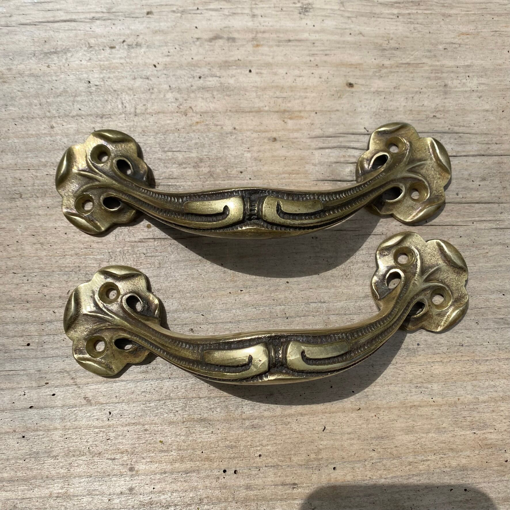 Pair of antique Art Nouveau brass handles